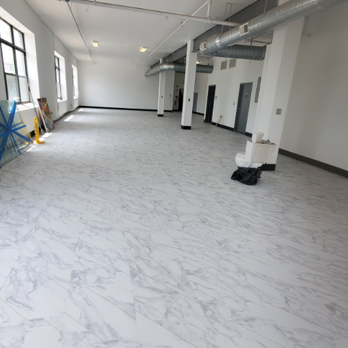 Philadelphia Flooring Solutions's commercial flooring work for Central Tattoo Studio in Philadelphia, PA