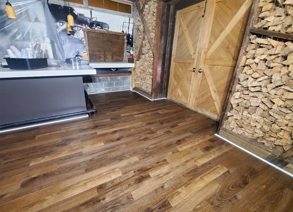Philadelphia Flooring Solutions's commercial wood flooring work for Porta Asbury Park in Yorktown, PA