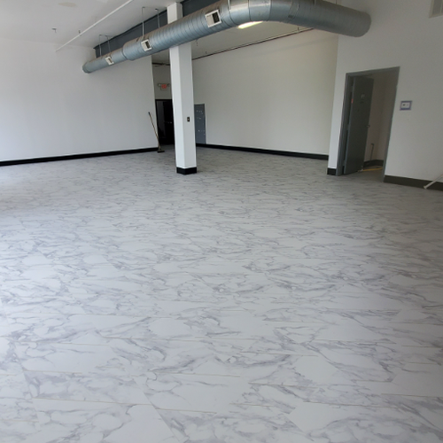 Philadelphia Flooring Solutions's commercial flooring work for Central Tattoo Studio in Philadelphia, PA