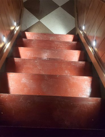 Before image of Philadelphia Flooring Solutions' commercial flooring work for Blind Barber Bar in Yorktown, PA